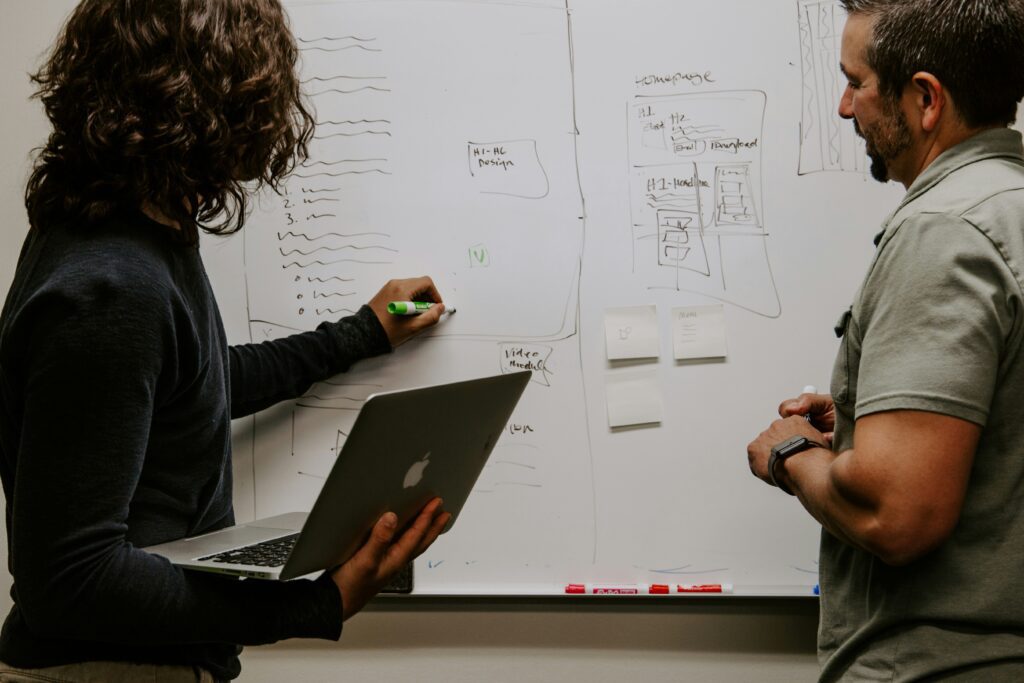 A team evaluating a DAM RFP submission.